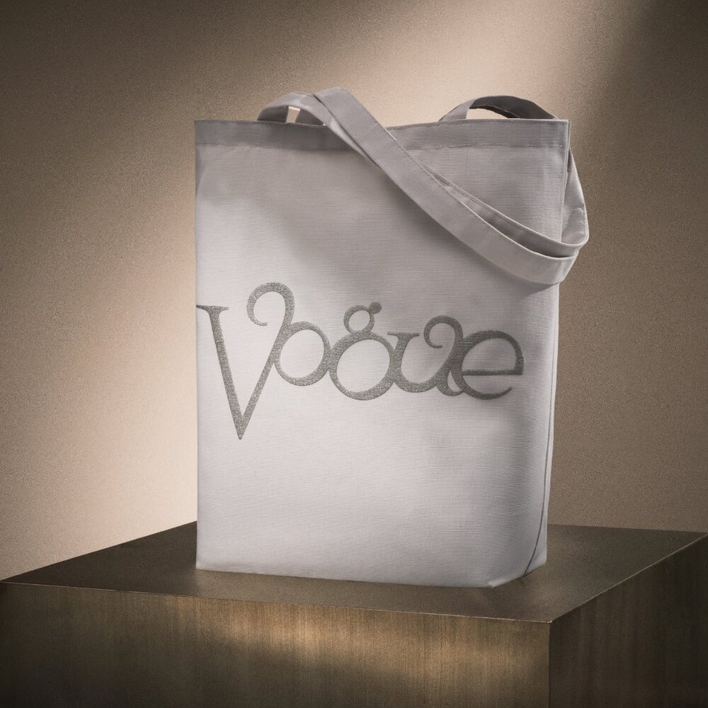 Brand new VOGUE collectible canvas tote with a silver metallic logo